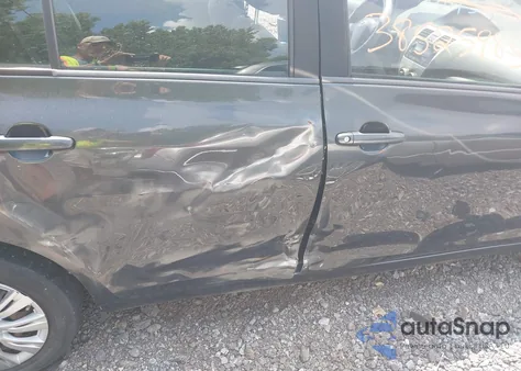 2009 Toyota Yaris from USA, damaged, VIN JTDBT903891318244